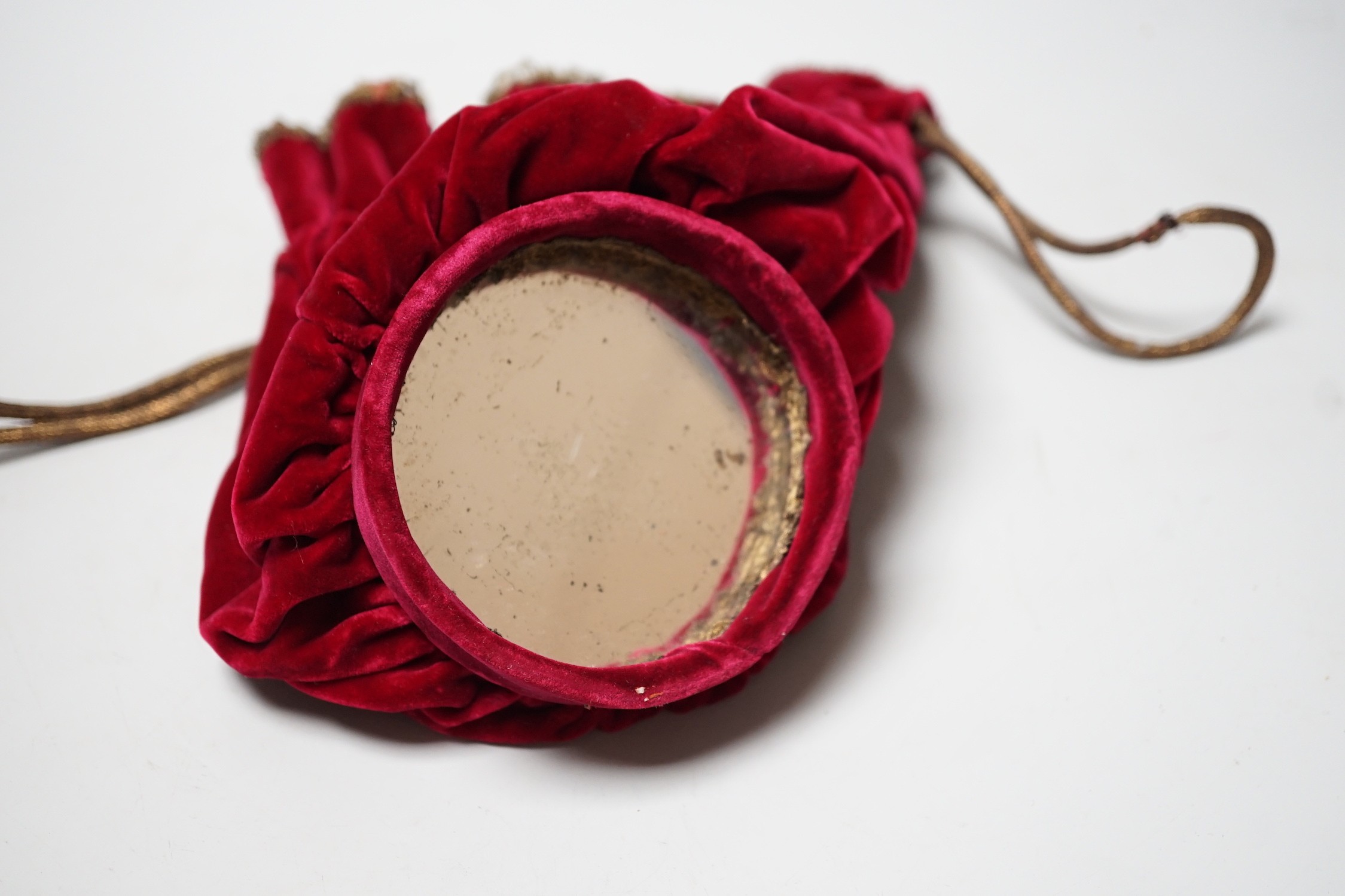 A peeress’s Coronation tiara and/or sandwich bag, 1953, velvet and gold-thread bearing initials of invited peeress, complete with original mirror plate, 22cm high, with provenance